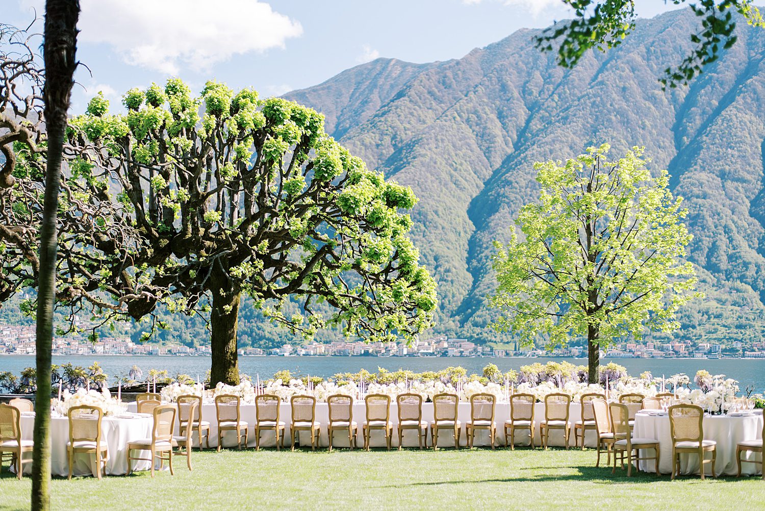 wedding reception on lawn at Villa Balbiano with white, ivory, and gold details 