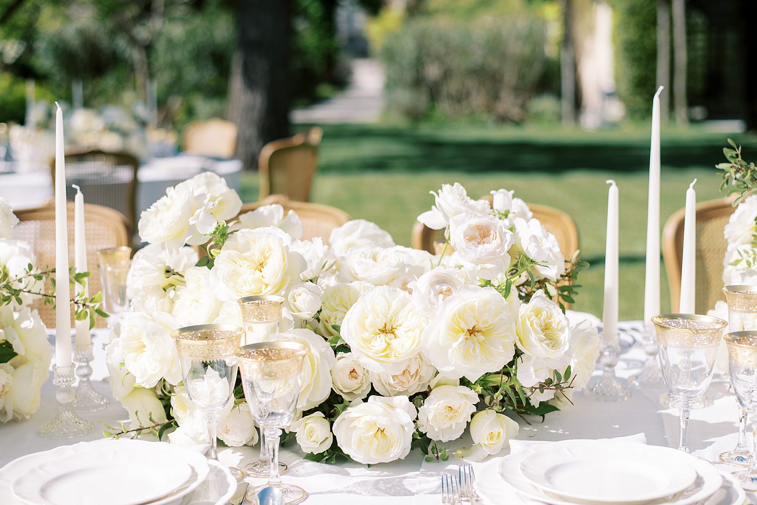 wedding reception centerpieces with white roses and flowers 