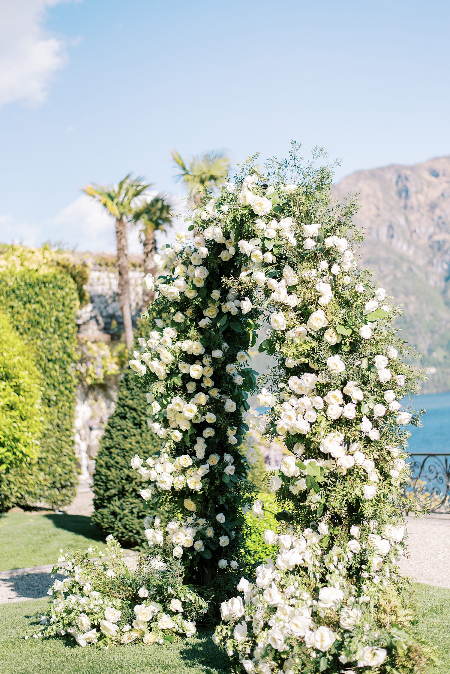 wedding ceremony arch with ivory roses at Villa Balbiano