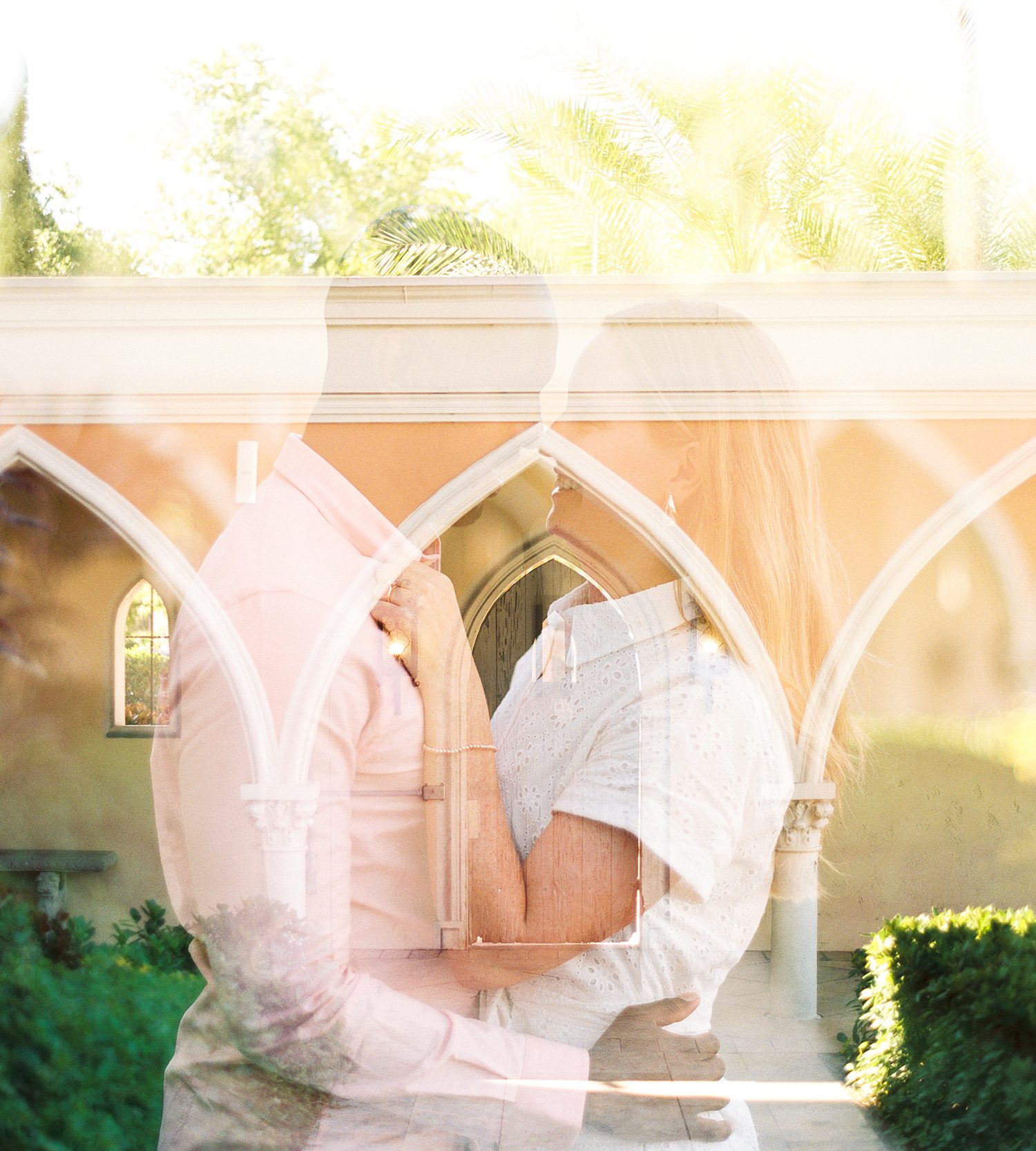 double exposed photo of couple hugging near arches in Tampa FL