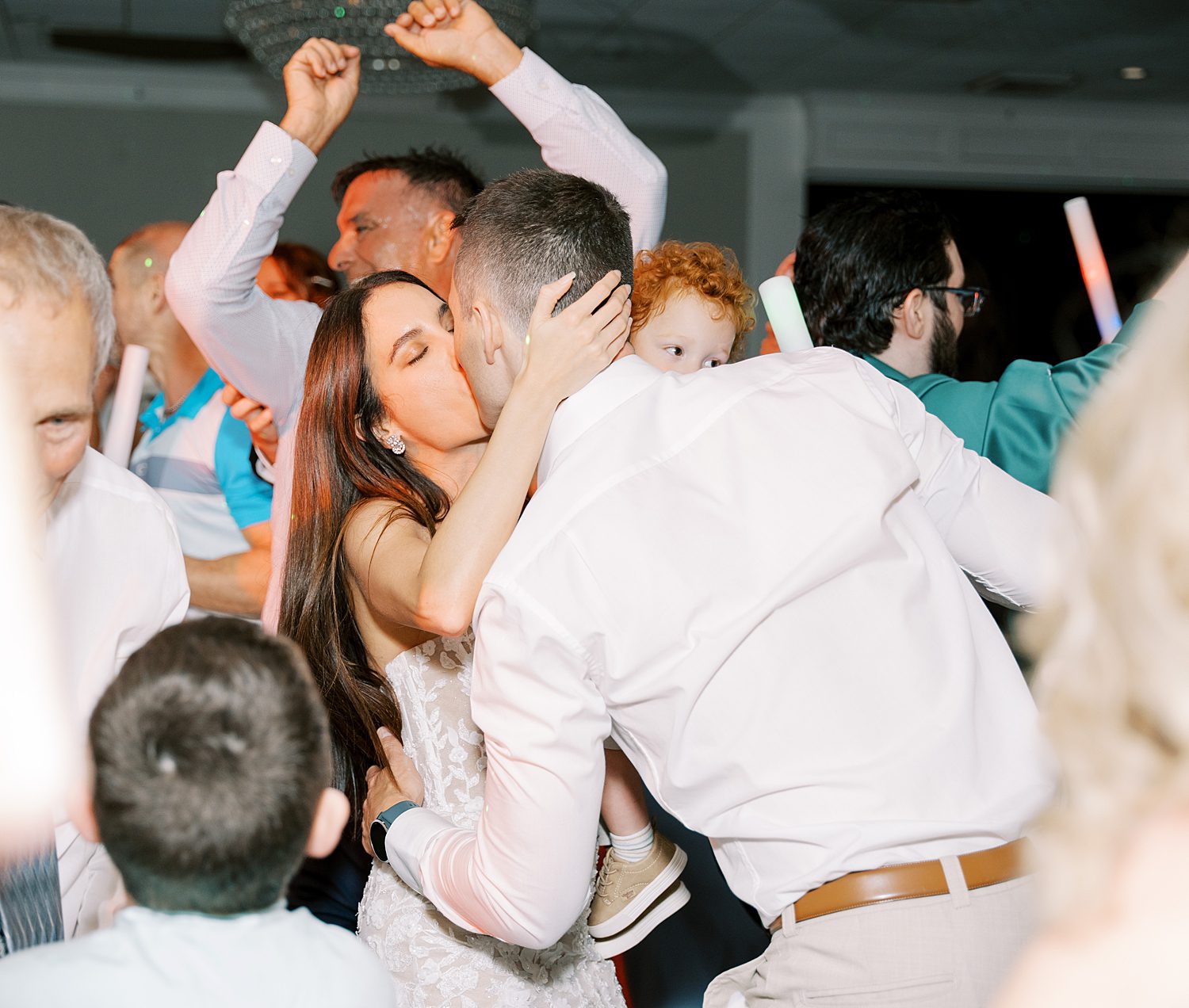 bride and groom kiss on the dance floor at the Rusty Pelican Tampa